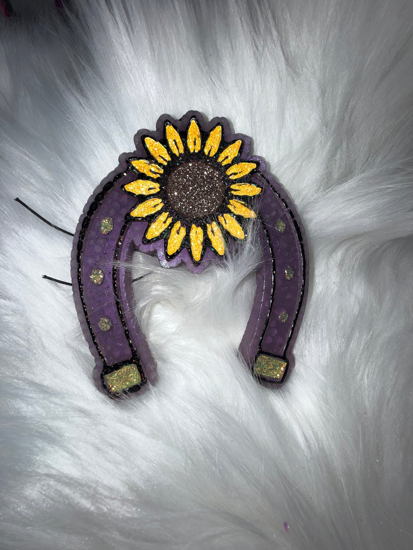 Horseshoe with sunflower